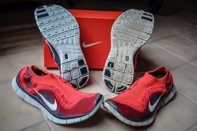 New and worn Nike Flyknit Free running shoes worn